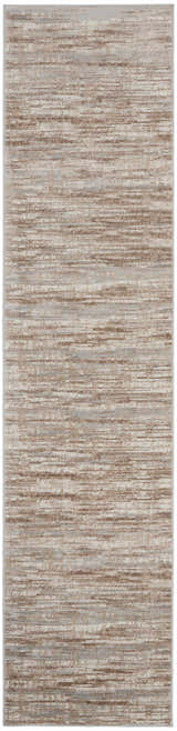 Close-up of the Nourison Elation Ivory Grey rug. Abstract design with chestnut, ivory, and grey hues. High pile texture.