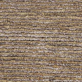 Close-up of the Calvin Klein Mesa Amber Rug. Shows a textured, looped pile with mustard and neutral color variations.