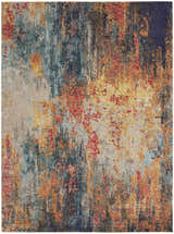Abstract multicolor design of the Nourison Celestial area rug. Modern style with red, orange, blue, and beige tones.