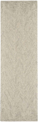 Close-up of the Nourison Interlock Ivory/Grey rug. Features a modern chevron pattern and textured wool weave.