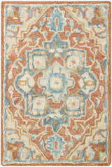 Close-up of the Nourison Maison Rust Ivory Vintage Indoor Area Rug, showcasing its floral pattern and textured pile.