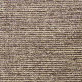 Close-up of the Nourison Weston Charcoal rug. Taupe and charcoal striations create a textured, modern design.