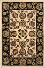 Close-up of Nourison Delano Ivory Black rug. Features floral patterns in chestnut, ivory, and black. Rectangle shape.