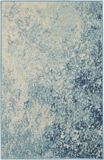 Close-up of the Nourison Passion Navy Light Blue rug, showing its abstract, mottled pattern and soft texture.