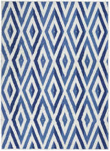 Close-up of the Nourison Whimsicle Ivory Blue rug featuring a modern diamond pattern in shades of blue and white.