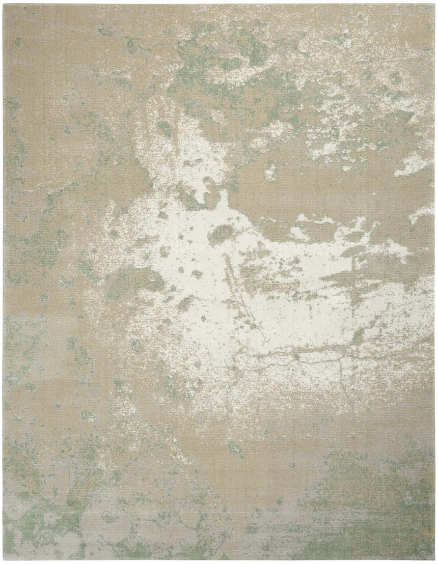 Close-up of the Nourison Twilight Ivory Green rug, showing the abstract chestnut, ivory, and green pattern.
