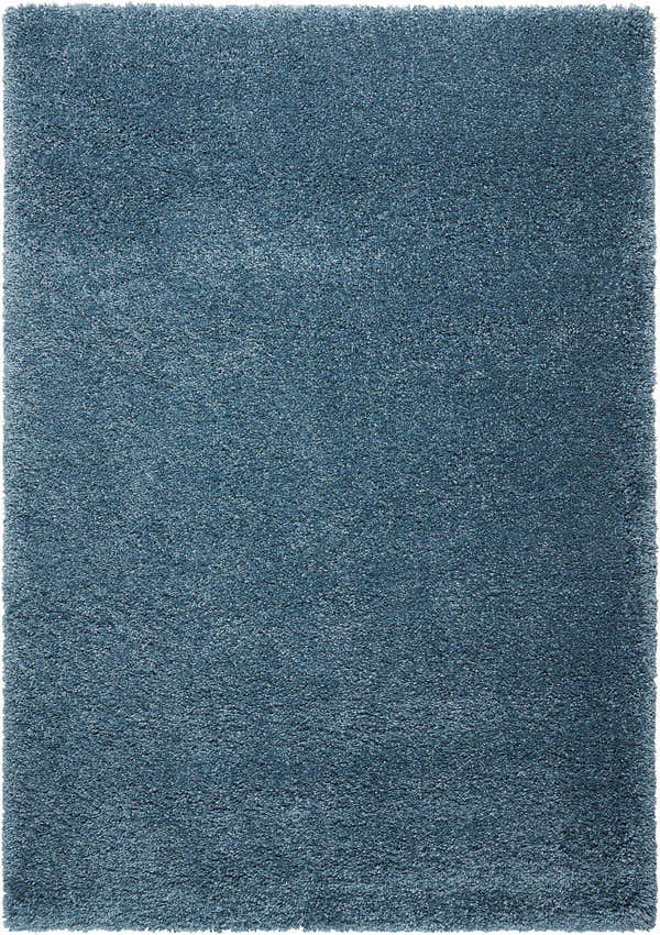 Close-up of the slate blue Nourison Amore shag rug, showing the soft texture and color variation. Clearance item.