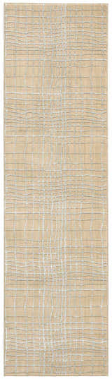 Close-up of Nourison Nepal Manilla Vintage rug. Manilla-colored wool rug with a grid-like vintage pattern.