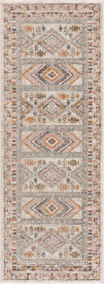 Close-up of the Diem Area Rug. Bohemian style with brick red, charcoal, dusty pink, and light gray diamond pattern. Design-Runner-2710