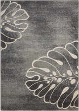 Close-up of Nourison Maxell Grey rug. Modern design with large, stylized leaf pattern in light gray on a textured gray background.