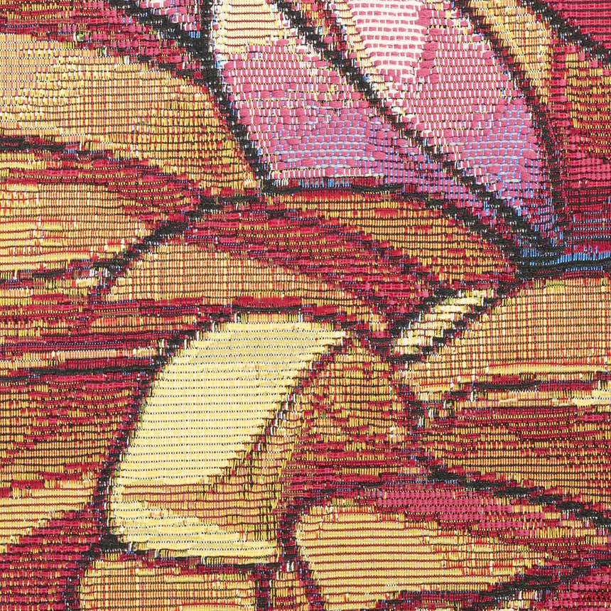 Close-up of the Nourison Color Splash Multicolor Outdoor Area Rug, showing woven texture and vibrant red, pink, and yellow hues.