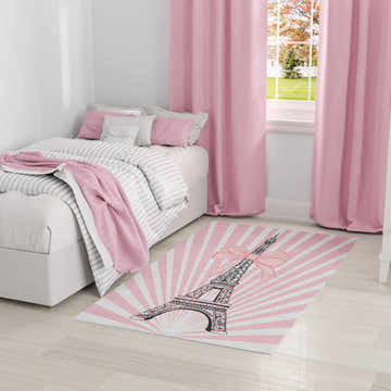 Kids bedroom with pink curtains and Nourison Imagination Pink Kids Area Rug featuring Eiffel Tower.