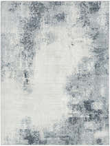 Close-up of the Nourison Dekor Grey Navy Rug, featuring a modern geometric pattern and high-pile texture.