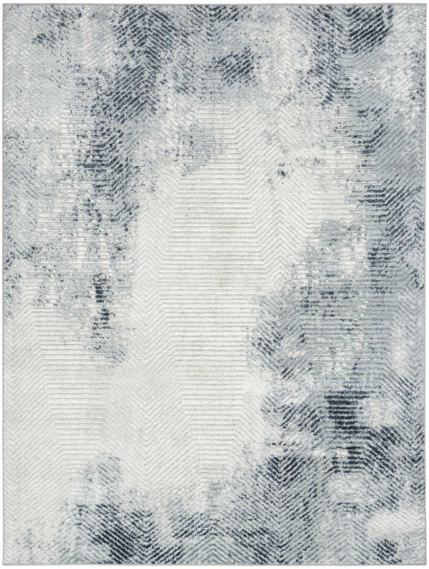 Close-up of the Nourison Dekor Grey Navy Rug, featuring a modern geometric pattern and high-pile texture.