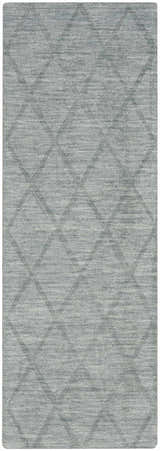 Close-up of the Nourison Wool Haven Blue rug, a handmade wool rug with a subtle diamond pattern and soft, light blue tones.