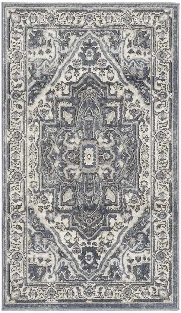 Close-up of the Nourison Quarry Navy Ivory Vintage Indoor Area Rug with a detailed floral and geometric pattern.