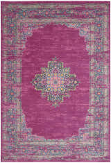 Close-up of the Nourison Passion Fuchsia rug, showcasing its bohemian pattern, fuchsia color, and distressed texture.