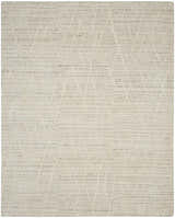 Close-up of the handmade Nourison OCEAN Pearl rug, featuring a subtle geometric pattern and pearl color.