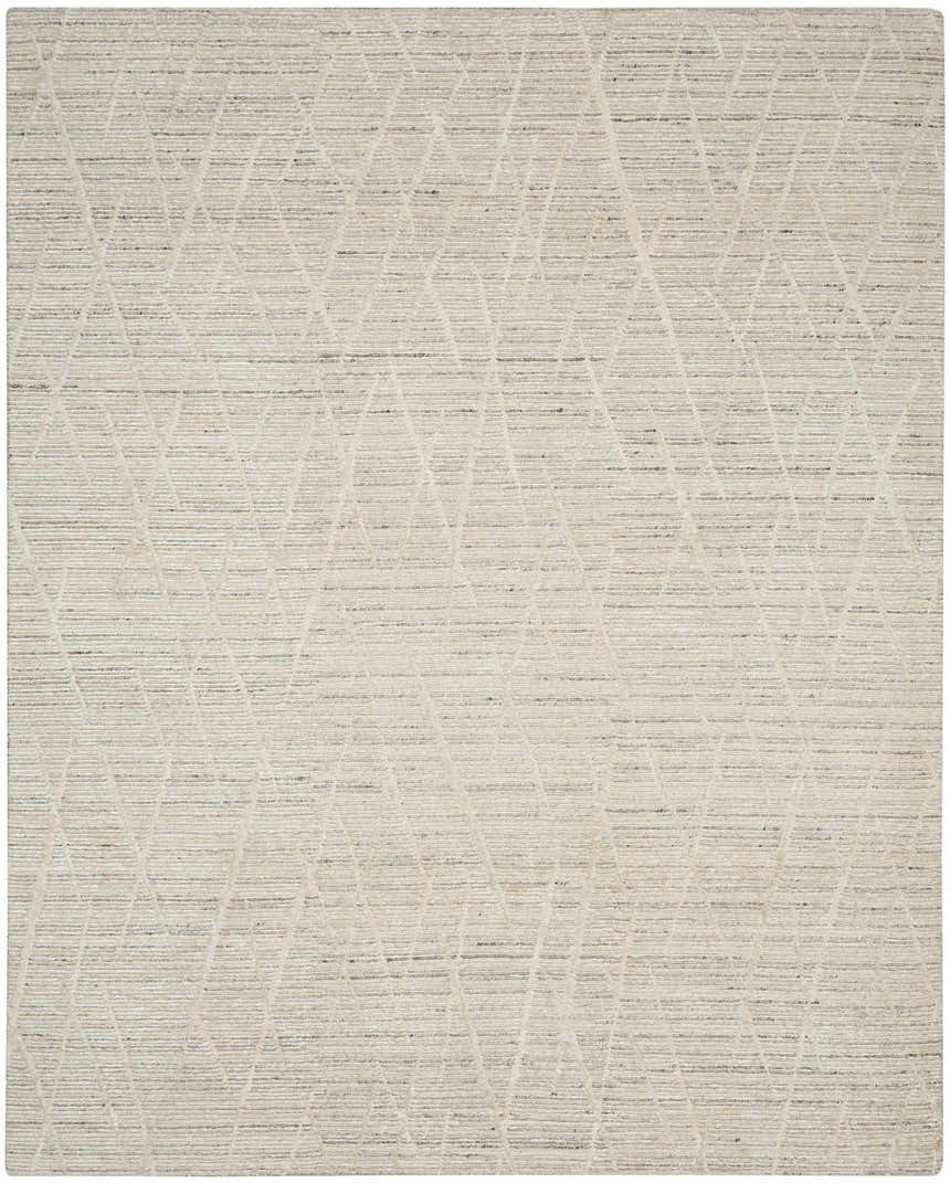 Close-up of the handmade Nourison OCEAN Pearl rug, featuring a subtle geometric pattern and pearl color.