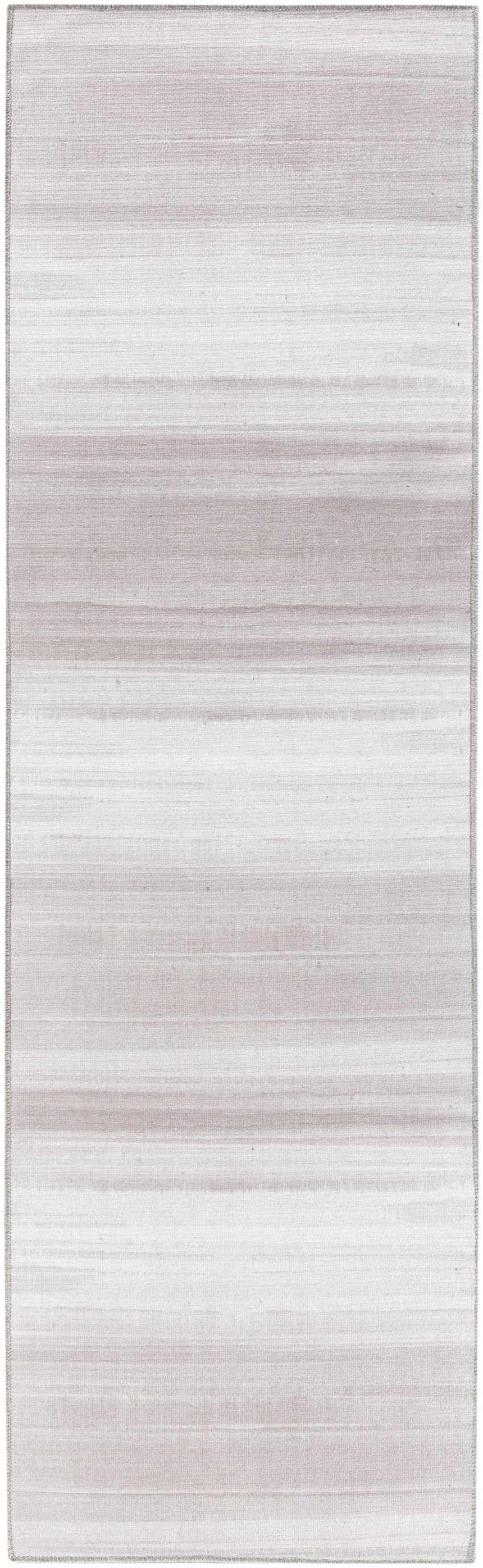 Close-up of Calvin Klein Launder Ivory rug. Modern design with horizontal stripes in ivory and chestnut tones. Washable.