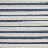 Close-up of the Nourison Key Largo Blue rug. Features a contemporary striped pattern in light blue and white.