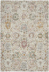 Close-up of the Nourison Twilight Ivory Multicolor rug, showcasing its chestnut, gold, green, and gray transitional pattern.