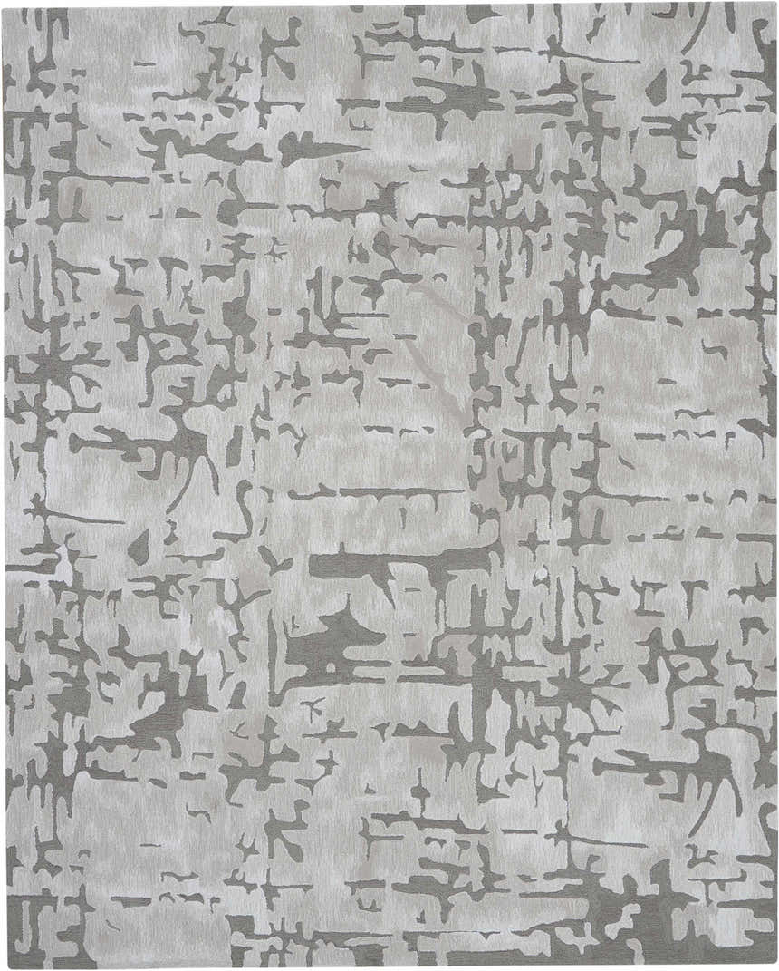 Close-up of the Nourison Symmetry Ivory/Taupe rug. Abstract, mid-century modern design with ivory and taupe colors. Handmade polyester rug.