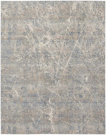 Close-up of the Nourison Exhale Beige Blue rug, showcasing its modern abstract pattern and high-pile texture.