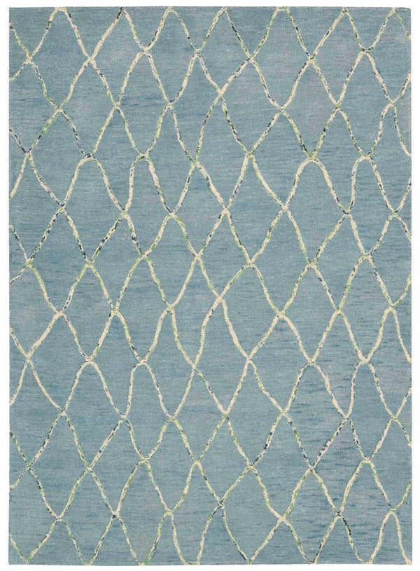 Close-up of the Barclay Butera Intermix Wave rug. Light blue wool with cream, green, and black diamond lattice pattern.