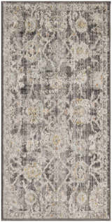 Close-up of Nourison Oushak Home Charcoal Vintage Area Rug, featuring a taupe, distressed floral pattern and soft texture.