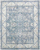 Detailed floral pattern of the Nourison Astra Blue Vintage Washable Area Rug. Light blue, vintage style.