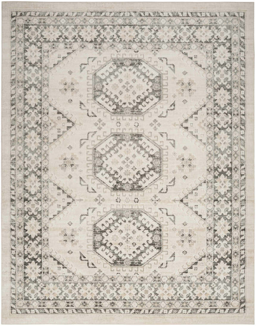 Close-up of Nourison Serenity Home Ivory Grey Vintage rug. High pile rug with chestnut accents and geometric pattern.