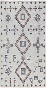 Close-up of Nourison New Concept Ivory Multicolor Bohemian Rug. Geometric shapes in chestnut, blue, and red.
