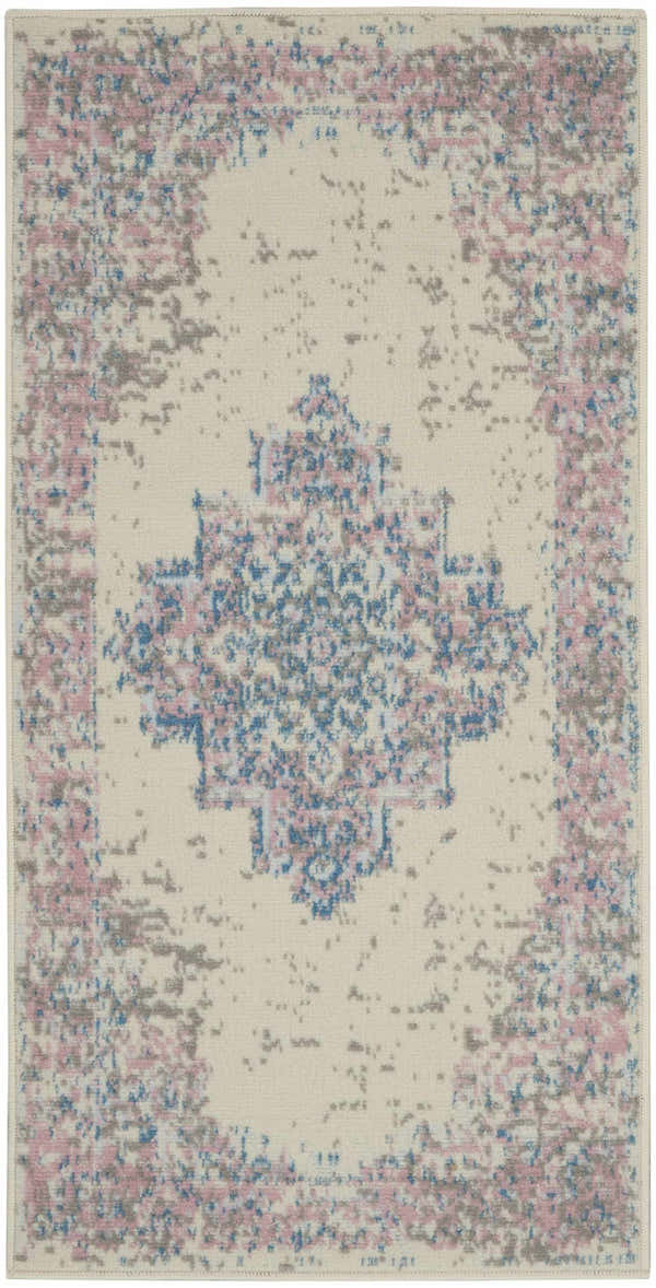 Close-up of the Nourison Grafix Ivory Pink Vintage Indoor Area Rug with a distressed floral medallion pattern.