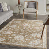 Living room scene with a Nourison Infinite Mocha Vintage Area Rug, light brown floral pattern, gray sofa and chair.