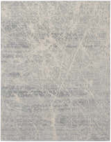 Close-up of the Nourison Exhale Ivory Grey rug, featuring a high pile and modern abstract pattern.