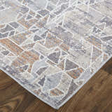 Close up of Feizy Francisco rug. Gray, blue, and orange abstract design on a transitional style area rug. Corner