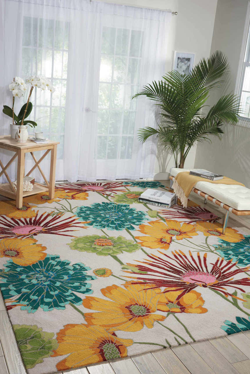 Bright living room with a Nourison Fantasy Ivory rug featuring large floral designs.