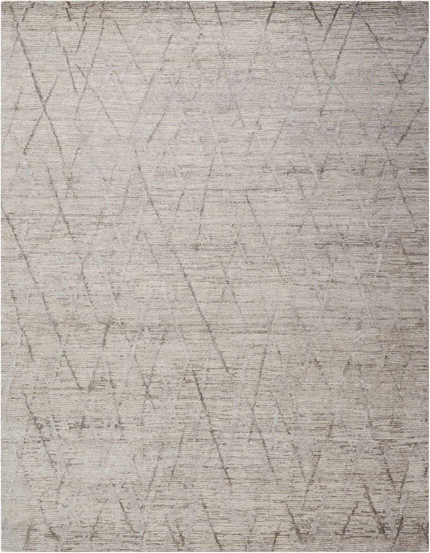 Close-up of the Nourison OCEAN Stone rug. Sandstone color with a subtle geometric pattern and handmade texture.