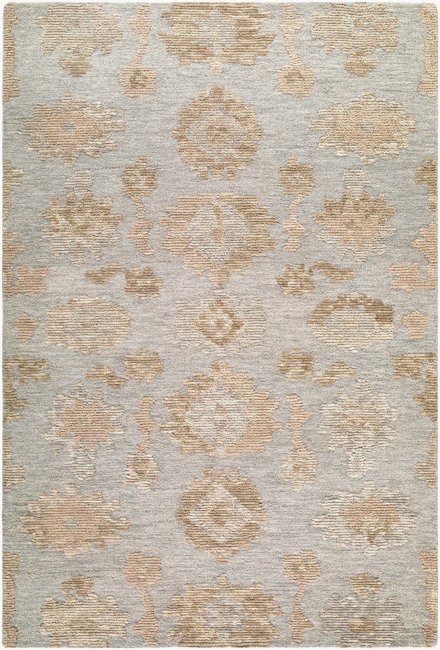Close-up of the hand-tufted Khalil Vokoko rug. Wool rug in medium gray with sandstone and taupe traditional floral pattern. Design-Rectangle-576