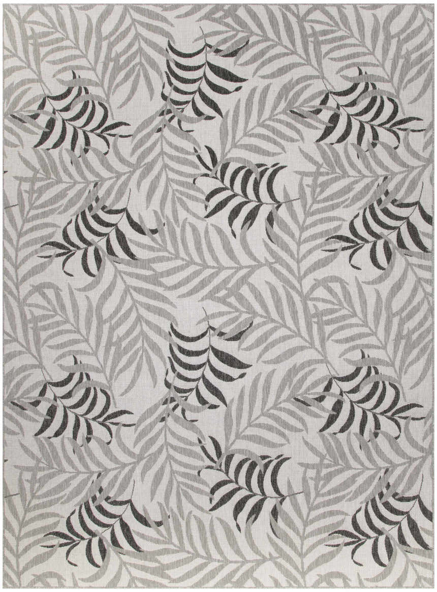 Close-up of the Nourison Garden Oasis Grey Tropical Area Rug featuring a gray tropical leaf pattern.