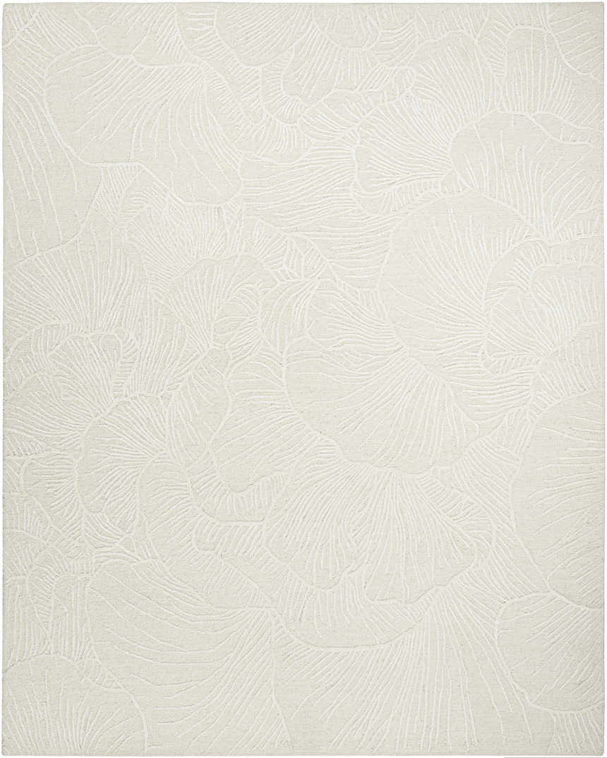 Close-up of the ivory Nourison Avra rug. Features a subtle, abstract floral pattern with a soft, textured wool feel.