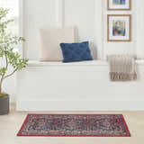 Bright hallway with Nourison Fulton Red Vintage Indoor Area Rug, pillows, throw, and art.