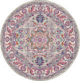 Detailed round Nourison Passion area rug in light gray and pink with a bohemian-inspired floral medallion pattern.