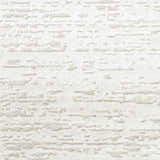 Close-up of the Nourison Dew Ivory Beige rug showing its low pile texture and chestnut-colored, modern design.