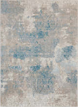 Close-up of Nourison Karma Ivory/Light Blue Vintage Area Rug, featuring a distressed chestnut, blue, and ivory pattern.