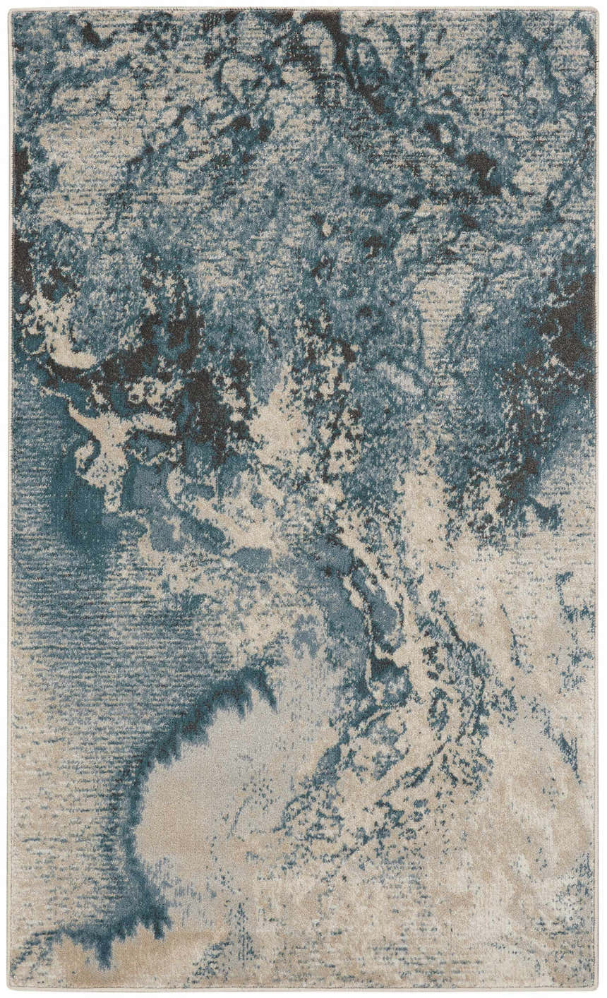 Close-up of Nourison Maxell Ivory/Teal rug. Abstract pattern with chestnut accents and a soft, textured polyester pile.