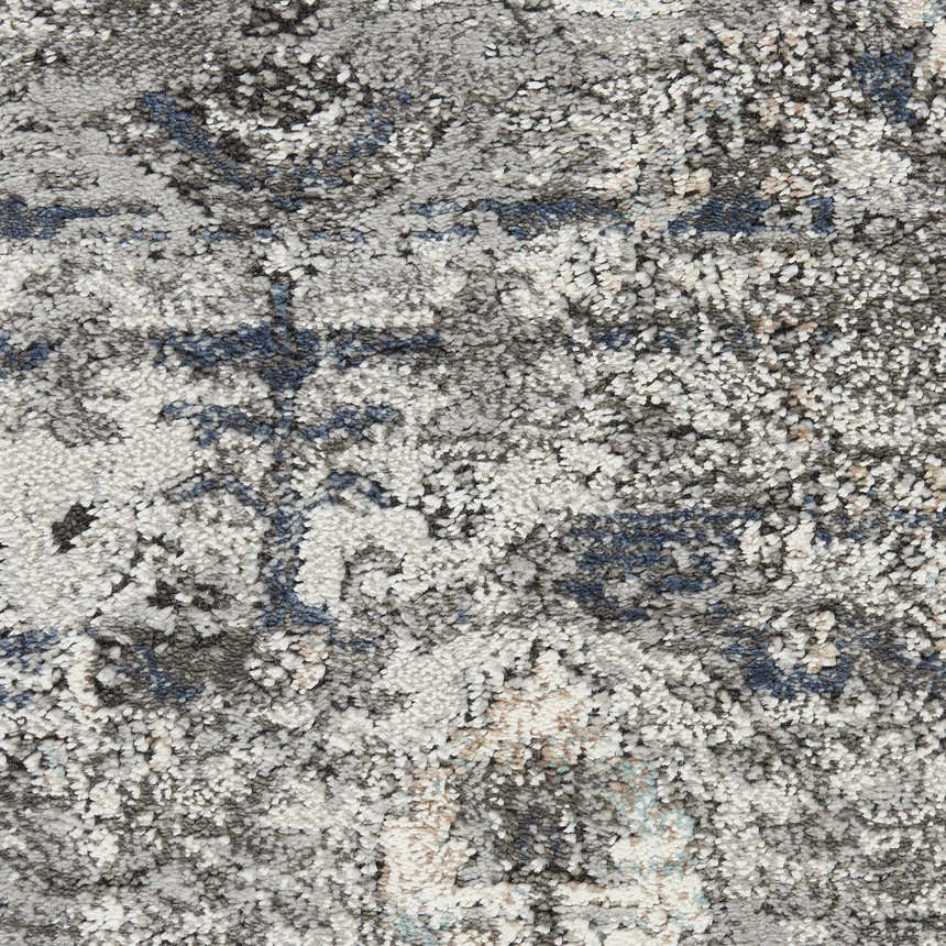 Close-up of the textured Nourison American Manor Blue Farmhouse Rug, showing light blue and gray tones.