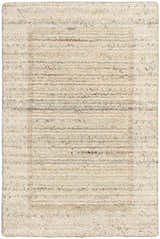 Close-up of the Calvin Klein CK082 Ridge rug. Beige and ivory wool rug with a subtle, farmhouse-style striped pattern.