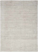 Close-up of the handmade Calvin Klein Valley Silver rug. Features a subtle gray, mid-century modern design.
